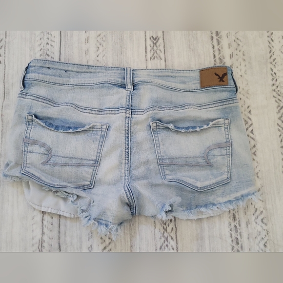 American Eagle Outfitters distressed blue denim shorts Size 10 - Picture 10 of 16